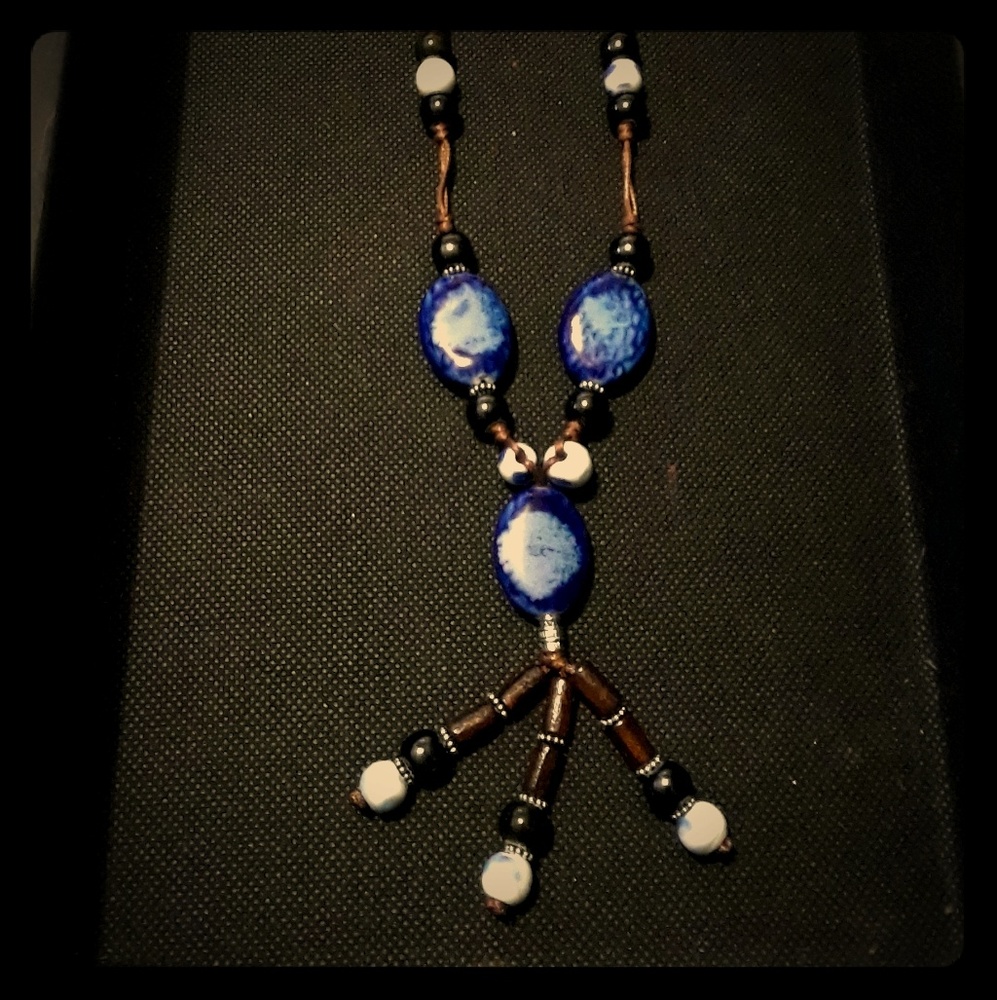 Blue beaded necklace with tassels